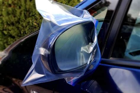 plastic bag over car mirror when traveling alone